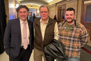 Sen. Aric Putnam, Darrell Larsen and Devon Johnson. 